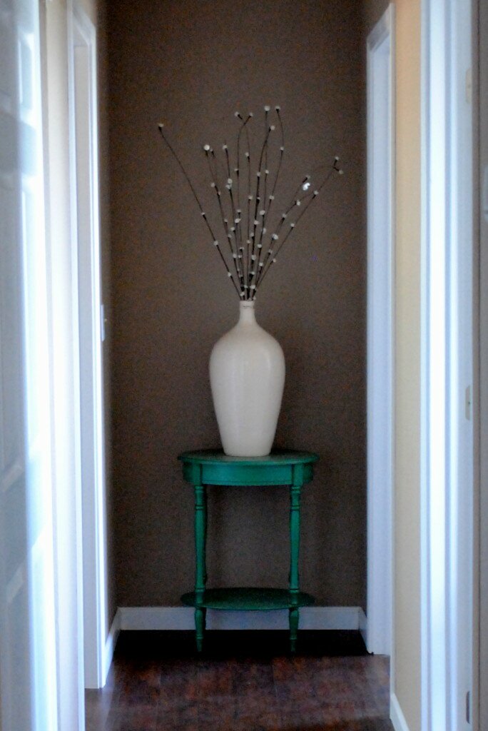 turquoise table with white vase